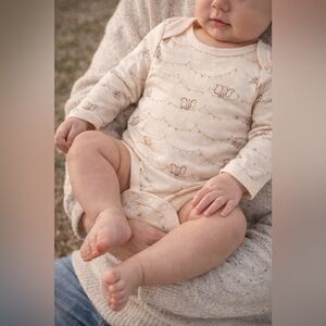 Adorable Cream Disney Dumbo Print Baby Onesie